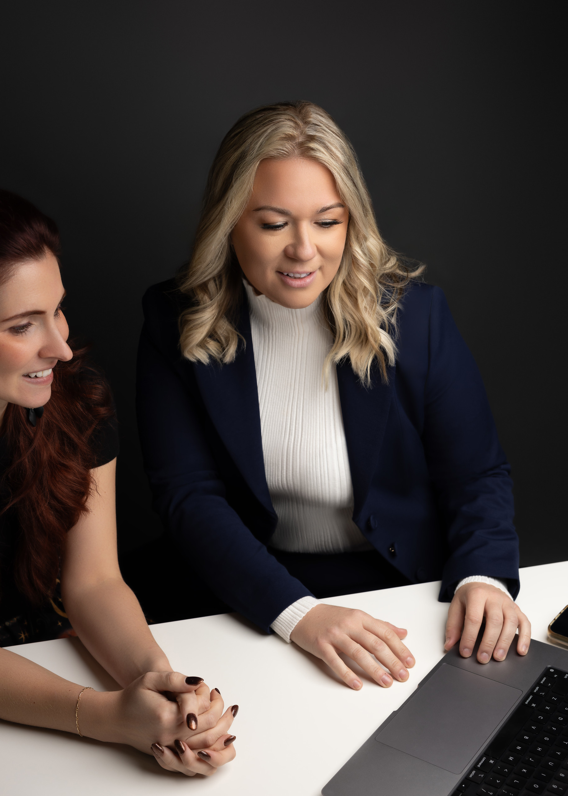Rebekah Passant reviewing case information with a client